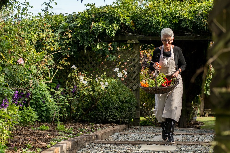 chef ali at te koi lodge garden for Slow Eco Travel in New Zealand